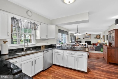 Discover your forever home in Bay Hills! This charming 4-bedroom on Bay Hills Golf Club in Maryland - for sale on GolfHomes.com, golf home, golf lot