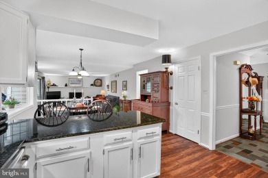 Discover your forever home in Bay Hills! This charming 4-bedroom on Bay Hills Golf Club in Maryland - for sale on GolfHomes.com, golf home, golf lot
