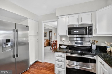 Discover your forever home in Bay Hills! This charming 4-bedroom on Bay Hills Golf Club in Maryland - for sale on GolfHomes.com, golf home, golf lot