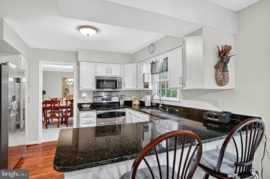 Discover your forever home in Bay Hills! This charming 4-bedroom on Bay Hills Golf Club in Maryland - for sale on GolfHomes.com, golf home, golf lot