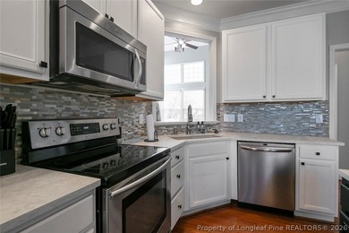 Welcome to this stunning 4-bedroom, 2.5-bath home nestled inside on Anderson Creek Golf Club in North Carolina - for sale on GolfHomes.com, golf home, golf lot