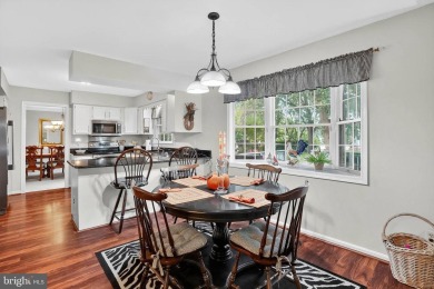Discover your forever home in Bay Hills! This charming 4-bedroom on Bay Hills Golf Club in Maryland - for sale on GolfHomes.com, golf home, golf lot