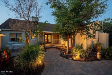 Stunning Tudor Revival home offering a perfect blend of classic on Encanto 18 Golf Course in Arizona - for sale on GolfHomes.com, golf home, golf lot