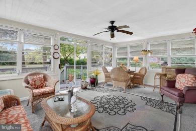 Discover your forever home in Bay Hills! This charming 4-bedroom on Bay Hills Golf Club in Maryland - for sale on GolfHomes.com, golf home, golf lot