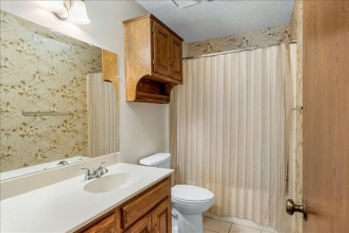 Discover the potential in this 3 bedroom, 2 bath home tucked on Hide-A-Way Lake Golf Course in Texas - for sale on GolfHomes.com, golf home, golf lot