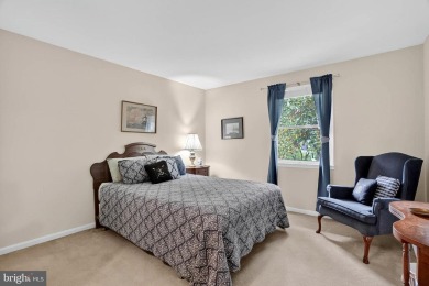 Discover your forever home in Bay Hills! This charming 4-bedroom on Bay Hills Golf Club in Maryland - for sale on GolfHomes.com, golf home, golf lot