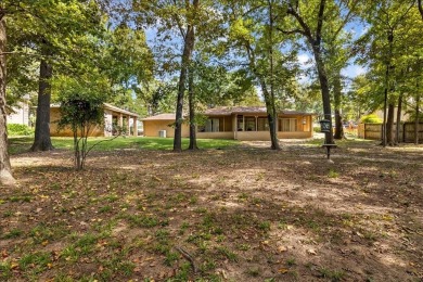 Discover the potential in this 3 bedroom, 2 bath home tucked on Hide-A-Way Lake Golf Course in Texas - for sale on GolfHomes.com, golf home, golf lot