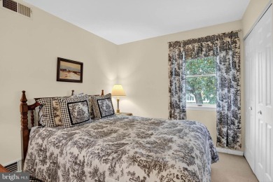 Discover your forever home in Bay Hills! This charming 4-bedroom on Bay Hills Golf Club in Maryland - for sale on GolfHomes.com, golf home, golf lot
