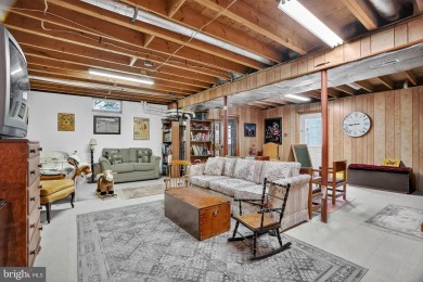 Discover your forever home in Bay Hills! This charming 4-bedroom on Bay Hills Golf Club in Maryland - for sale on GolfHomes.com, golf home, golf lot