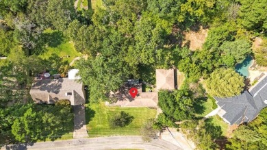 Discover the potential in this 3 bedroom, 2 bath home tucked on Hide-A-Way Lake Golf Course in Texas - for sale on GolfHomes.com, golf home, golf lot