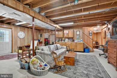 Discover your forever home in Bay Hills! This charming 4-bedroom on Bay Hills Golf Club in Maryland - for sale on GolfHomes.com, golf home, golf lot