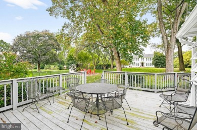 Discover your forever home in Bay Hills! This charming 4-bedroom on Bay Hills Golf Club in Maryland - for sale on GolfHomes.com, golf home, golf lot