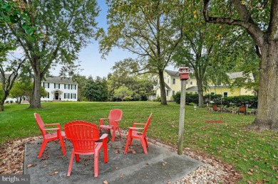 Discover your forever home in Bay Hills! This charming 4-bedroom on Bay Hills Golf Club in Maryland - for sale on GolfHomes.com, golf home, golf lot