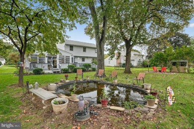 Discover your forever home in Bay Hills! This charming 4-bedroom on Bay Hills Golf Club in Maryland - for sale on GolfHomes.com, golf home, golf lot