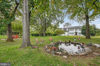Discover your forever home in Bay Hills! This charming 4-bedroom on Bay Hills Golf Club in Maryland - for sale on GolfHomes.com, golf home, golf lot