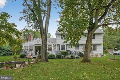 Discover your forever home in Bay Hills! This charming 4-bedroom on Bay Hills Golf Club in Maryland - for sale on GolfHomes.com, golf home, golf lot