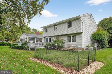 Discover your forever home in Bay Hills! This charming 4-bedroom on Bay Hills Golf Club in Maryland - for sale on GolfHomes.com, golf home, golf lot