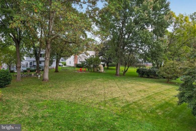 Discover your forever home in Bay Hills! This charming 4-bedroom on Bay Hills Golf Club in Maryland - for sale on GolfHomes.com, golf home, golf lot