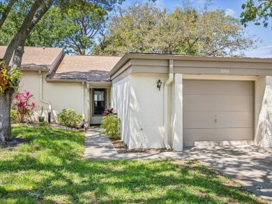 This delightful 2BR/2BA/1 Car Garage villa, nestled in the on Tarpon Springs Golf Course in Florida - for sale on GolfHomes.com, golf home, golf lot