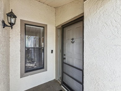 This delightful 2BR/2BA/1 Car Garage villa, nestled in the on Tarpon Springs Golf Course in Florida - for sale on GolfHomes.com, golf home, golf lot