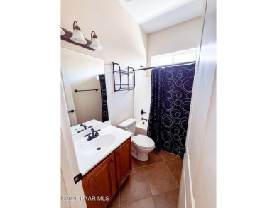 Owned Solar! Whether you're looking to retire or raise a family on Quail Wood Greens Golf Course in Arizona - for sale on GolfHomes.com, golf home, golf lot