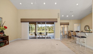 Tucked away on a private interior street off the main on River Wilderness Golf and Country Club in Florida - for sale on GolfHomes.com, golf home, golf lot