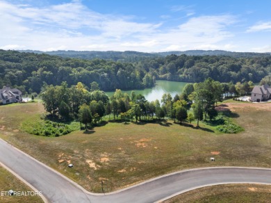 This exquisite 0.51 acre waterfront lot on Tellico Lake offers a on Wind River Golf Course in Tennessee - for sale on GolfHomes.com, golf home, golf lot