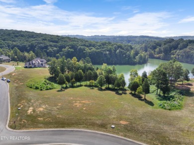 This exquisite 0.51 acre waterfront lot on Tellico Lake offers a on Wind River Golf Course in Tennessee - for sale on GolfHomes.com, golf home, golf lot