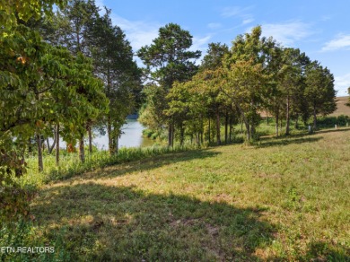 This exquisite 0.51 acre waterfront lot on Tellico Lake offers a on Wind River Golf Course in Tennessee - for sale on GolfHomes.com, golf home, golf lot