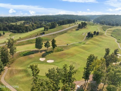 This exquisite 0.51 acre waterfront lot on Tellico Lake offers a on Wind River Golf Course in Tennessee - for sale on GolfHomes.com, golf home, golf lot