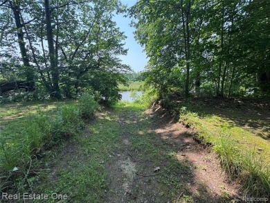 **Investment Opportunity** VALUE IS IN THE LAND! - Here is your on Kearsley Lake Golf Course in Michigan - for sale on GolfHomes.com, golf home, golf lot