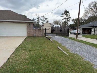Love Golf,  You will love this beautiful home on the 13th green on Millbrook Country Club in Mississippi - for sale on GolfHomes.com, golf home, golf lot