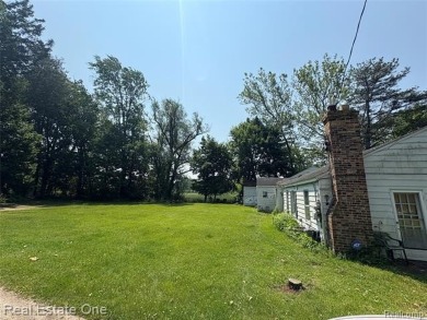 **Investment Opportunity** VALUE IS IN THE LAND! - Here is your on Kearsley Lake Golf Course in Michigan - for sale on GolfHomes.com, golf home, golf lot