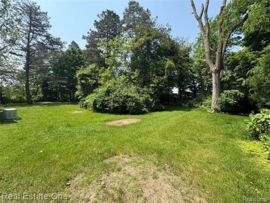 **Investment Opportunity** VALUE IS IN THE LAND! - Here is your on Kearsley Lake Golf Course in Michigan - for sale on GolfHomes.com, golf home, golf lot