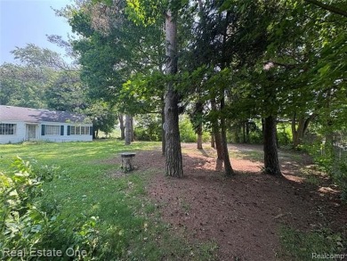 **Investment Opportunity** VALUE IS IN THE LAND! - Here is your on Kearsley Lake Golf Course in Michigan - for sale on GolfHomes.com, golf home, golf lot