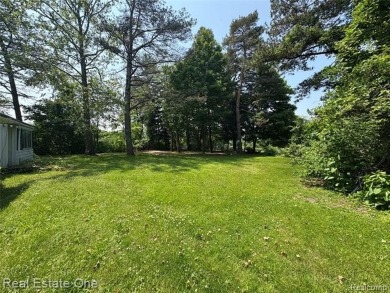**Investment Opportunity** VALUE IS IN THE LAND! - Here is your on Kearsley Lake Golf Course in Michigan - for sale on GolfHomes.com, golf home, golf lot