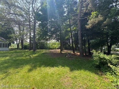 **Investment Opportunity** VALUE IS IN THE LAND! - Here is your on Kearsley Lake Golf Course in Michigan - for sale on GolfHomes.com, golf home, golf lot
