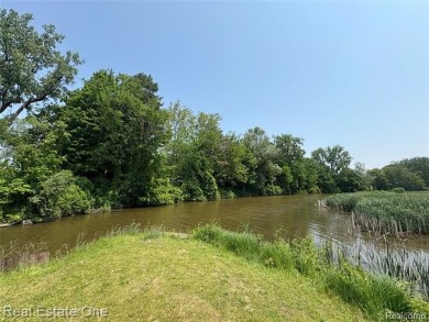 **Investment Opportunity** VALUE IS IN THE LAND! - Here is your on Kearsley Lake Golf Course in Michigan - for sale on GolfHomes.com, golf home, golf lot