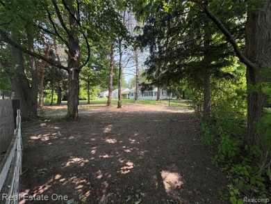 **Investment Opportunity** VALUE IS IN THE LAND! - Here is your on Kearsley Lake Golf Course in Michigan - for sale on GolfHomes.com, golf home, golf lot