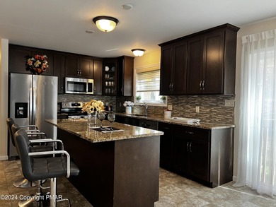 Experience Refined Living in The Estate at Great Bear Nestled on Caesars Pocono Palace Resort in Pennsylvania - for sale on GolfHomes.com, golf home, golf lot