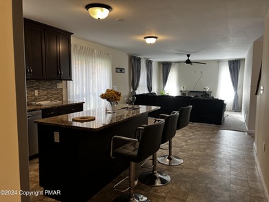 Experience Refined Living in The Estate at Great Bear Nestled on Caesars Pocono Palace Resort in Pennsylvania - for sale on GolfHomes.com, golf home, golf lot