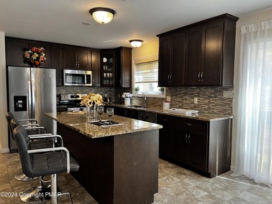 Experience Refined Living in The Estate at Great Bear Nestled on Caesars Pocono Palace Resort in Pennsylvania - for sale on GolfHomes.com, golf home, golf lot