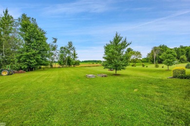 Discover your dream home with this stunning 2,146 square foot on Belle River Golf and Country Club in Michigan - for sale on GolfHomes.com, golf home, golf lot