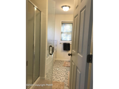 Experience Refined Living in The Estate at Great Bear Nestled on Caesars Pocono Palace Resort in Pennsylvania - for sale on GolfHomes.com, golf home, golf lot