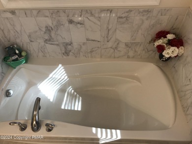 Experience Refined Living in The Estate at Great Bear Nestled on Caesars Pocono Palace Resort in Pennsylvania - for sale on GolfHomes.com, golf home, golf lot