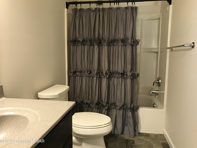 Experience Refined Living in The Estate at Great Bear Nestled on Caesars Pocono Palace Resort in Pennsylvania - for sale on GolfHomes.com, golf home, golf lot