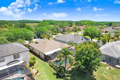Under contract-accepting backup offers. Immaculate Pool Home on on The Eagles Golf Course and Club in Florida - for sale on GolfHomes.com, golf home, golf lot