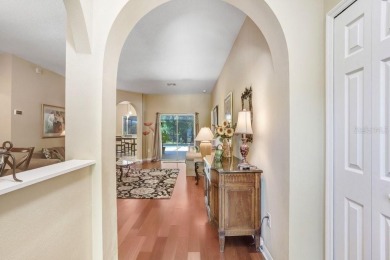Under contract-accepting backup offers. Immaculate Pool Home on on The Eagles Golf Course and Club in Florida - for sale on GolfHomes.com, golf home, golf lot