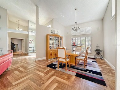 Welcome to 50 Willowood Ln -- a private luxury estate in Oldsmar on East Lake Woodlands Country Club in Florida - for sale on GolfHomes.com, golf home, golf lot