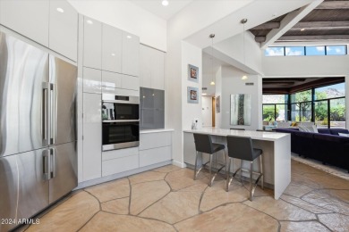 Step into elegance with this beautifully remodeled home on Desert Highlands Golf Club in Arizona - for sale on GolfHomes.com, golf home, golf lot
